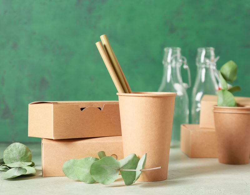 eco-containers-for-food-and-drinks-on-color-backgr-2026-01-11-09-26-31-utc